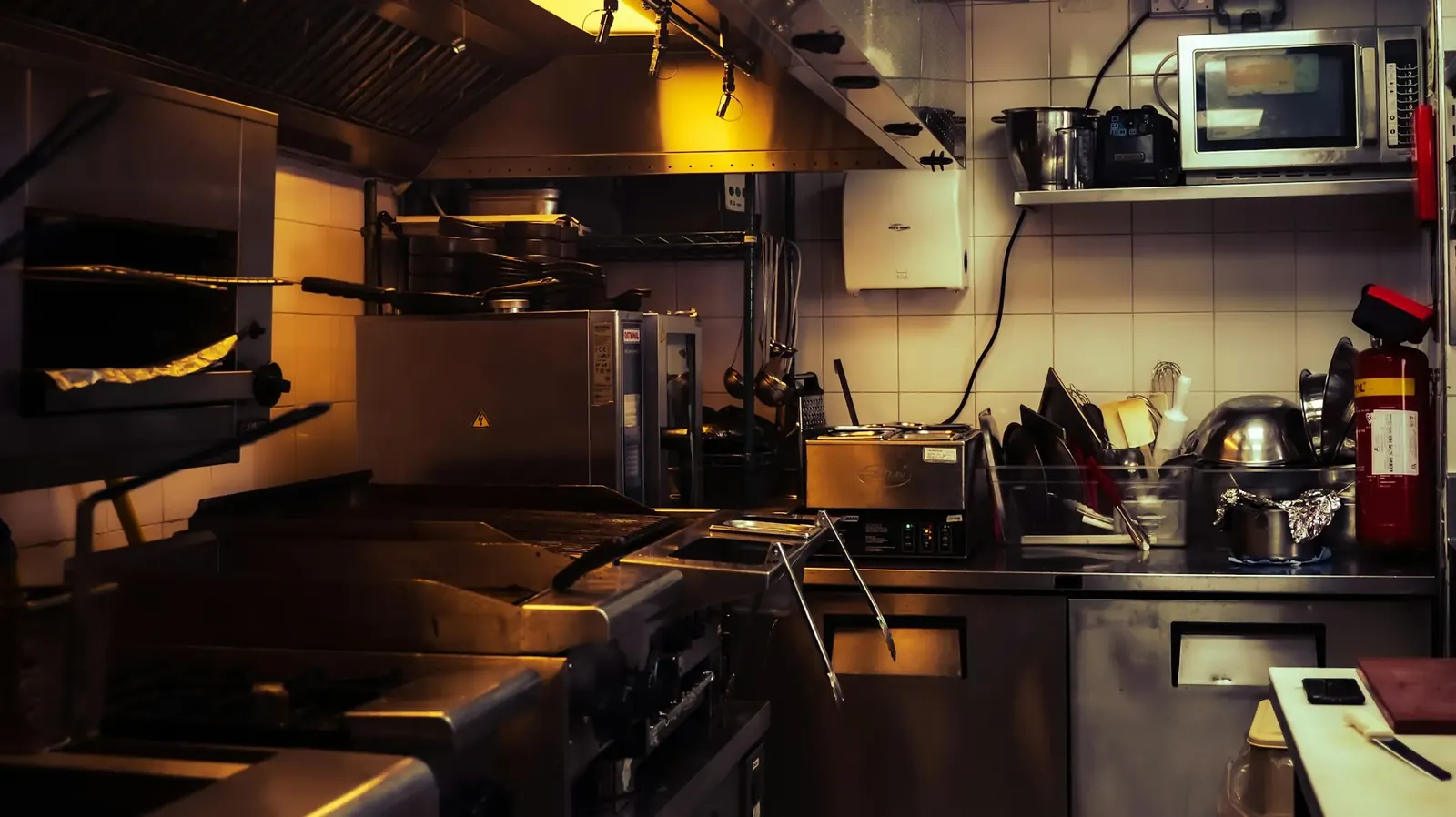 Commercial kitchen with stainless prep stations
