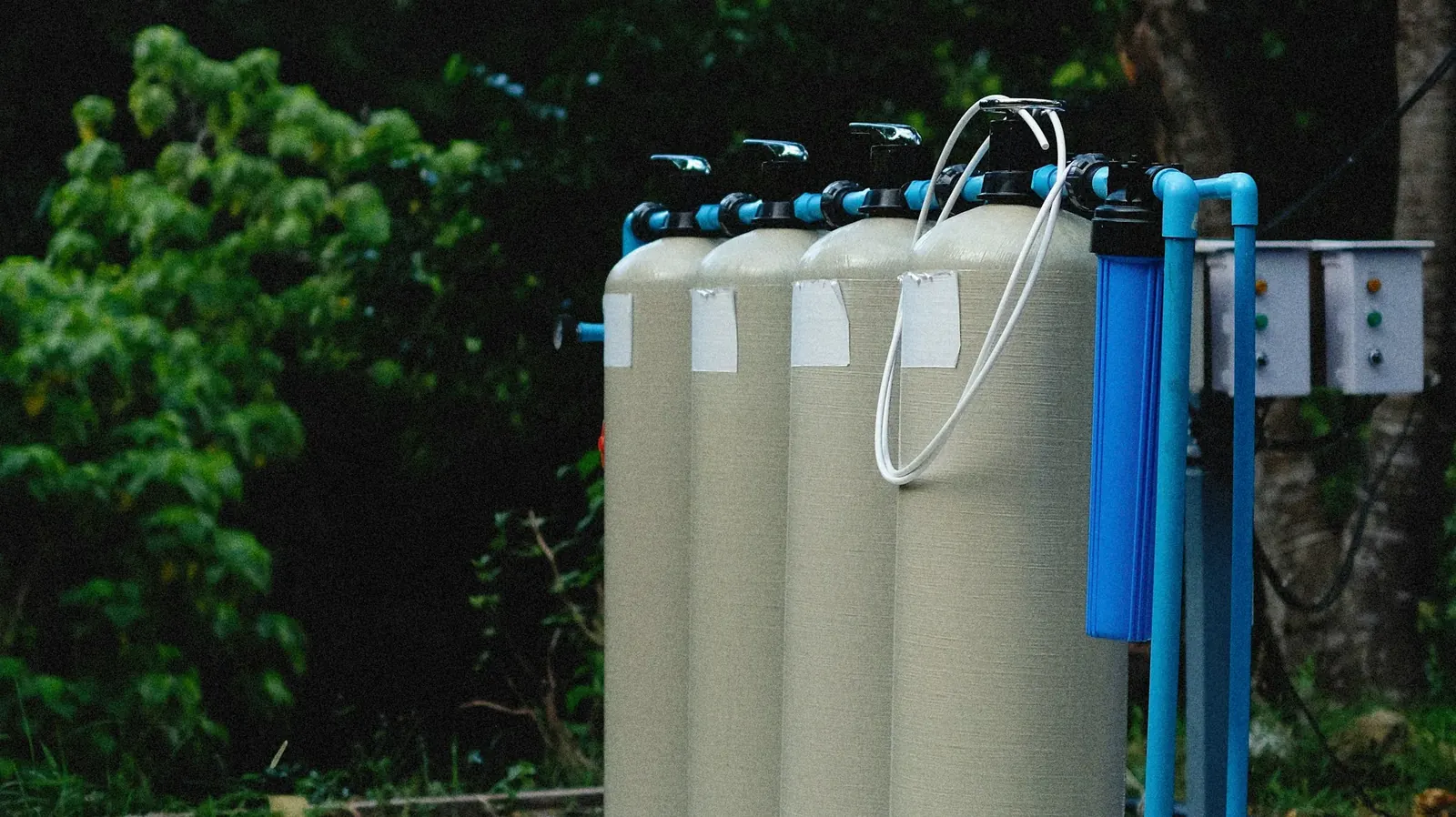 Filtration tanks connected to blue water lines