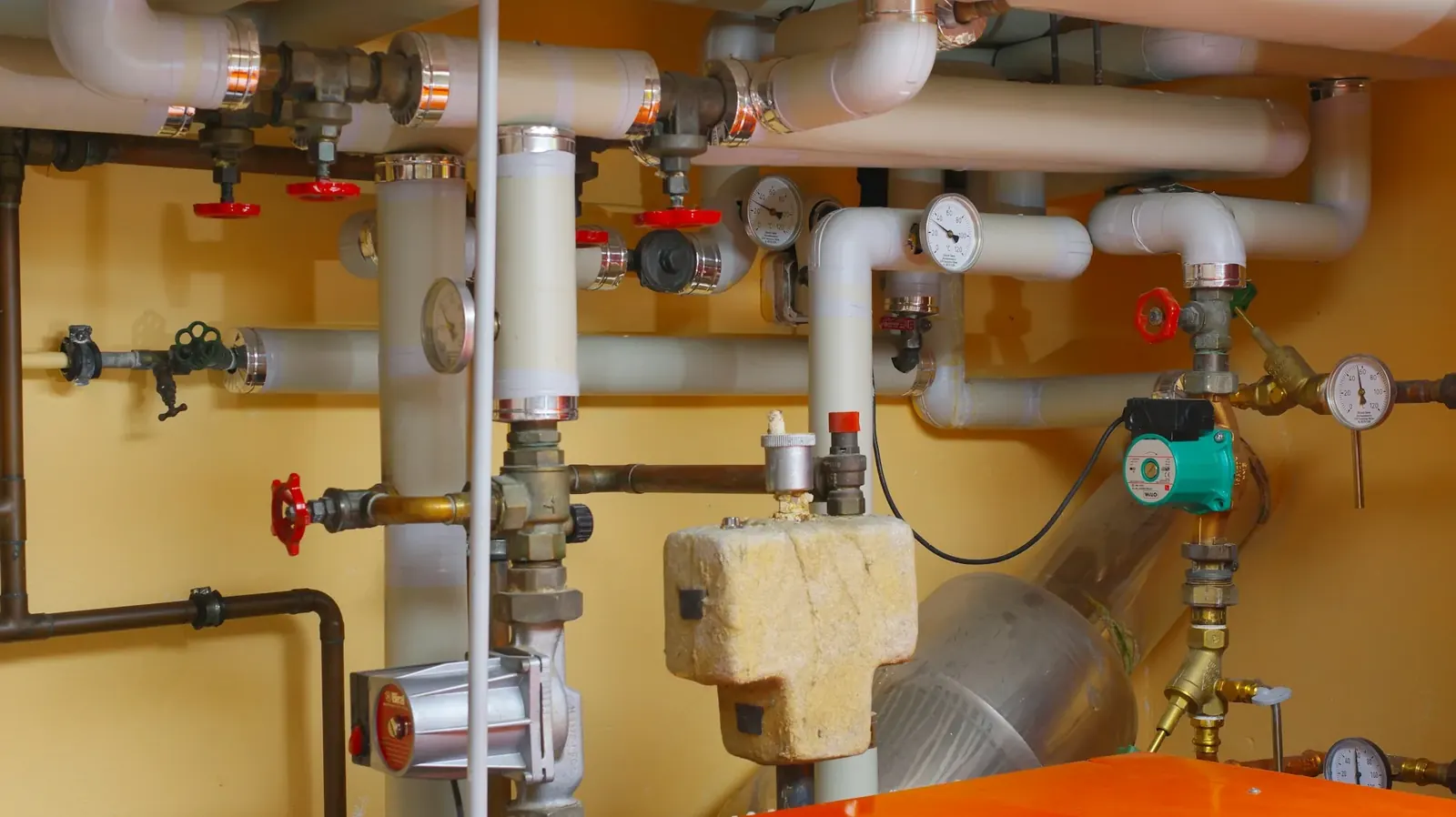 Basement manifold with valves and pressure gauges